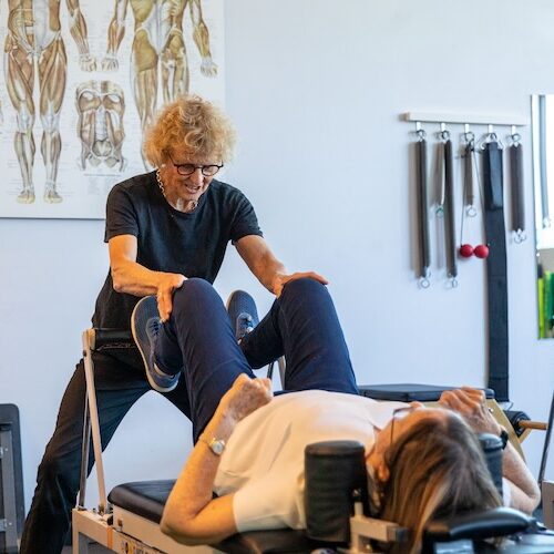Woman on an exercise machine during cardiac rehab training