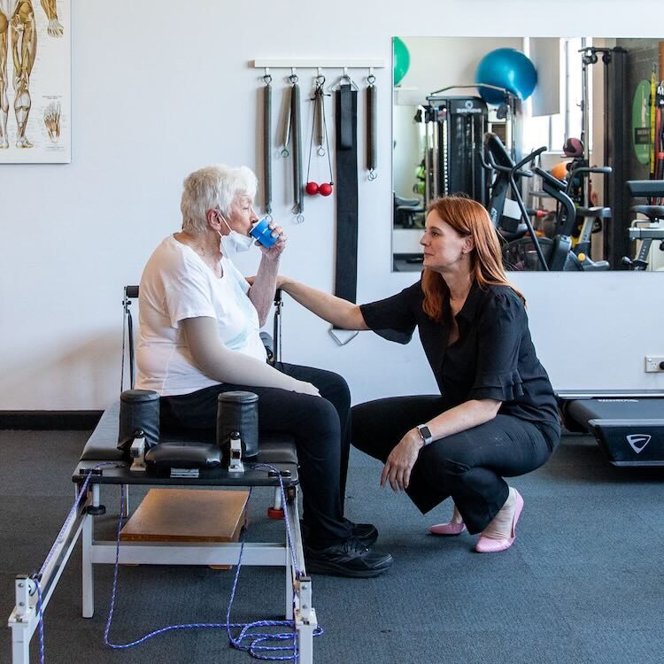 incontinence-physio-sydney-karen Karen with a patient during an incontinence physio session